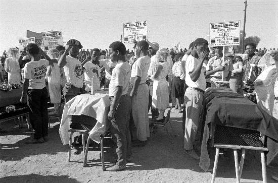 The funeral of the Cradock Four included guards of honour for Matthew Goniwe, Sicelo Mhlauli, Sparrow Mkhonto, Fort Calata, 19 July, 1985, Gille de Vlieg Collection, AL3274_C29.6