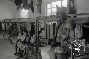  Refugees relaxing in their sleeping quarters in the Francistown transit camp