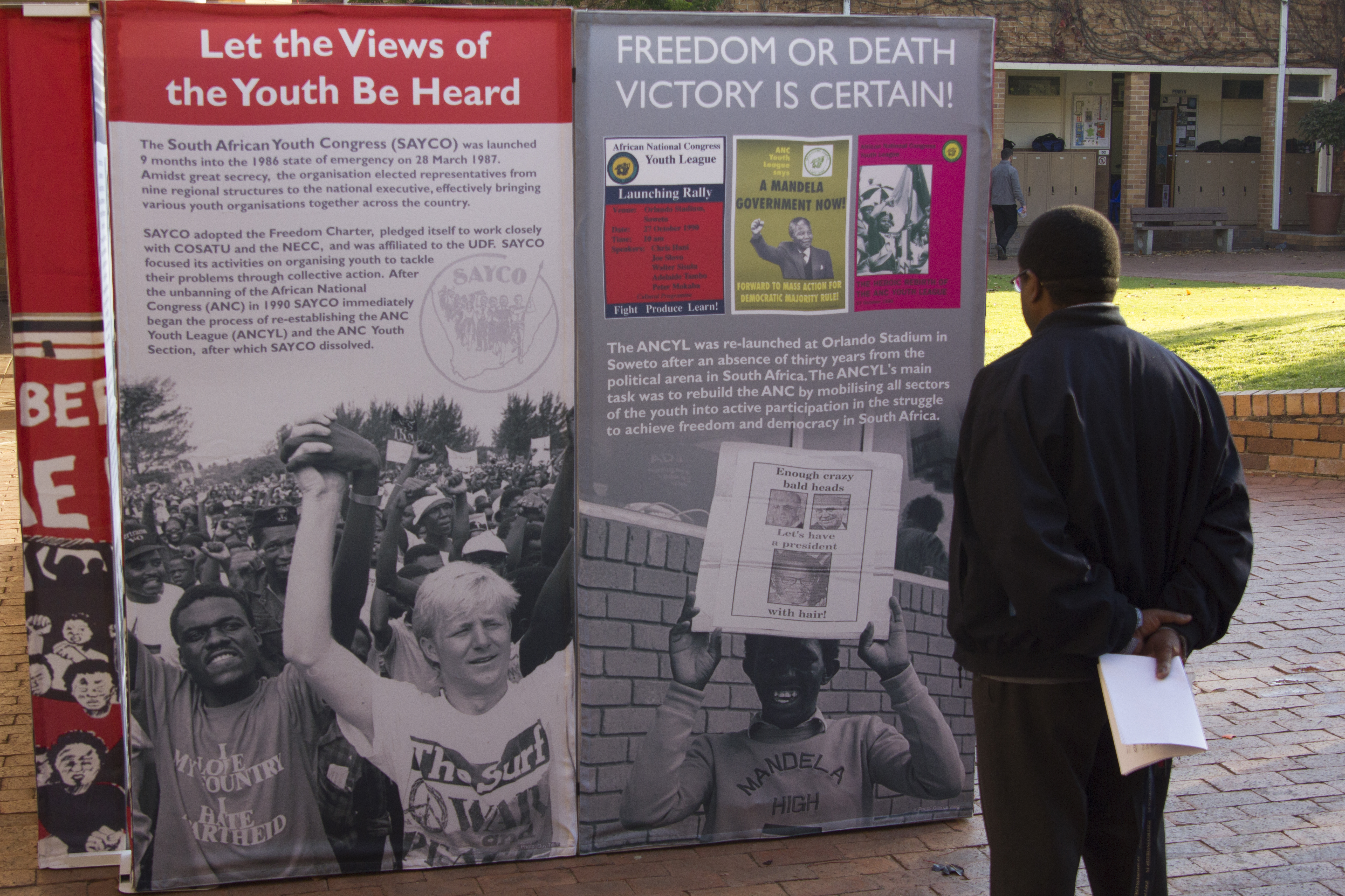 A man admiring the loaned out Youth Exhibition 